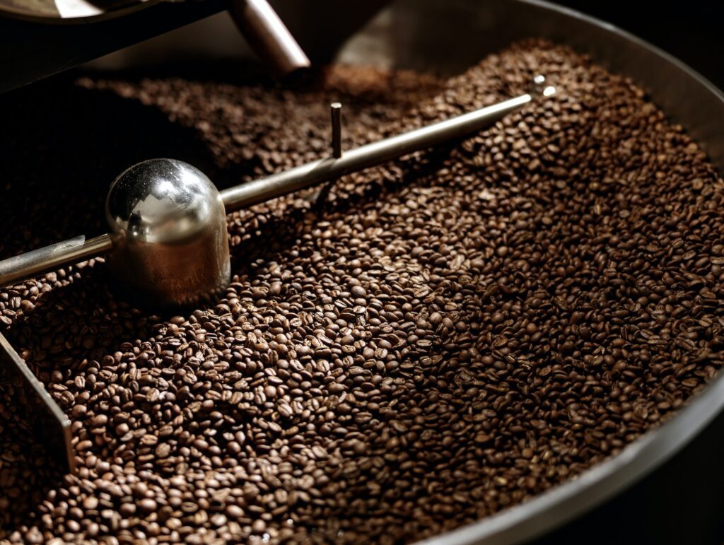 Cooling tray with brown roasted coffee beans