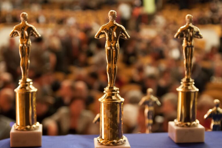 Golden Oscar trophy sitting on table - Specialty Coffee & Tea Catering