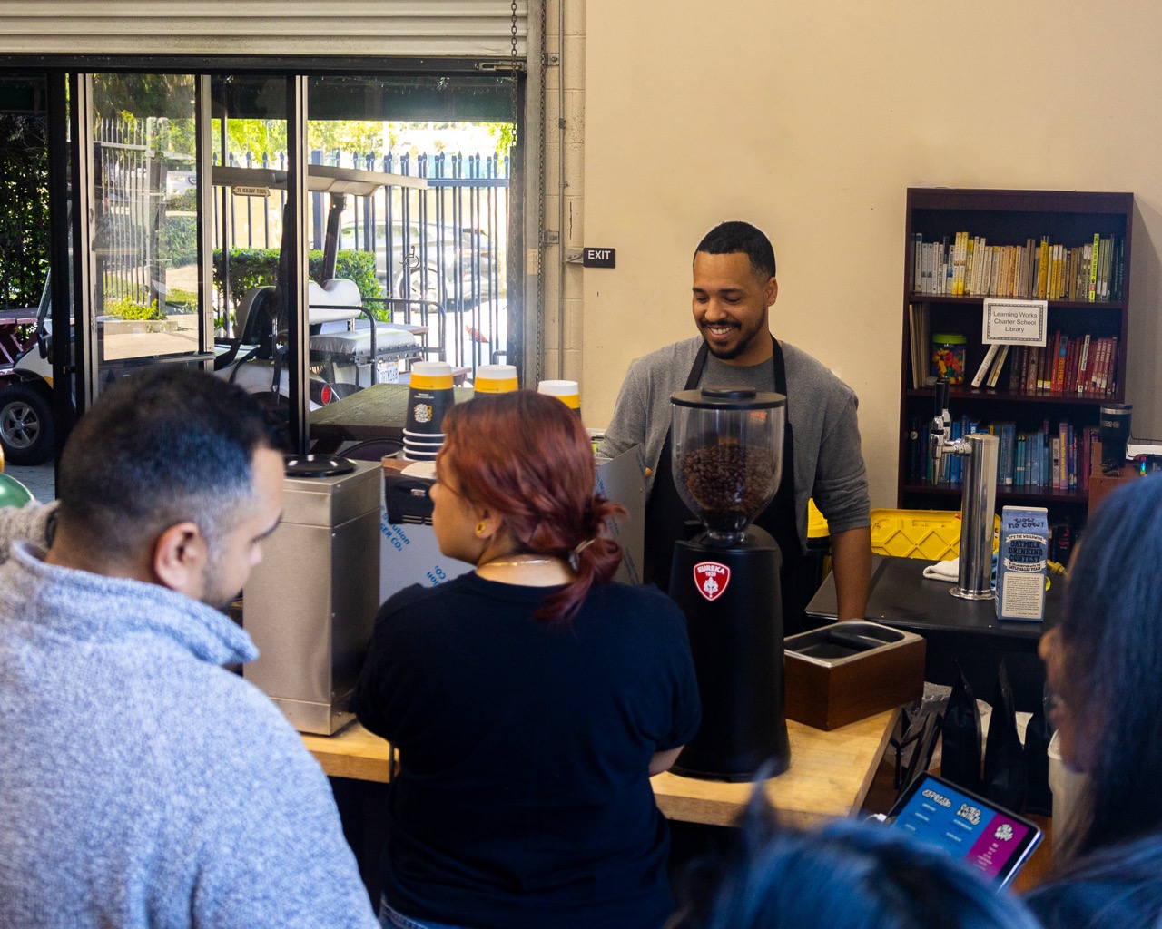 Coffee Cart Boys's Founder, Daniel Vasquez, making coffee a fun way to support staff and teachers at Learning Works Charter School.